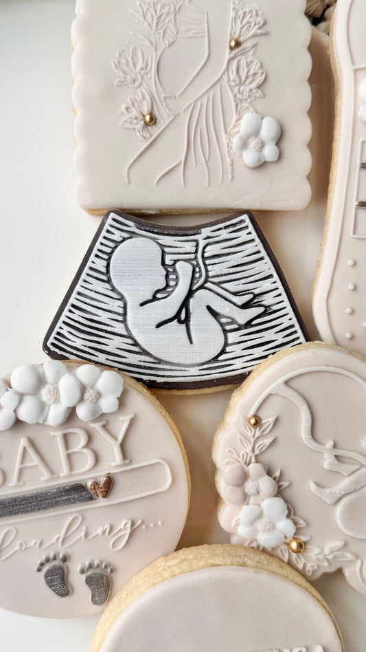 pregnancy ultrasound + cookie cutter